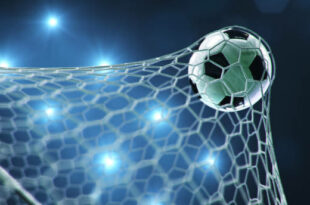 Soccer ball flew into the goal. Soccer ball bends the net, against the background of flashes of light. Soccer ball in goal net on blue background. A moment of delight, 3D illustration