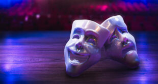 Theater masks, drama and comedy on a dark background